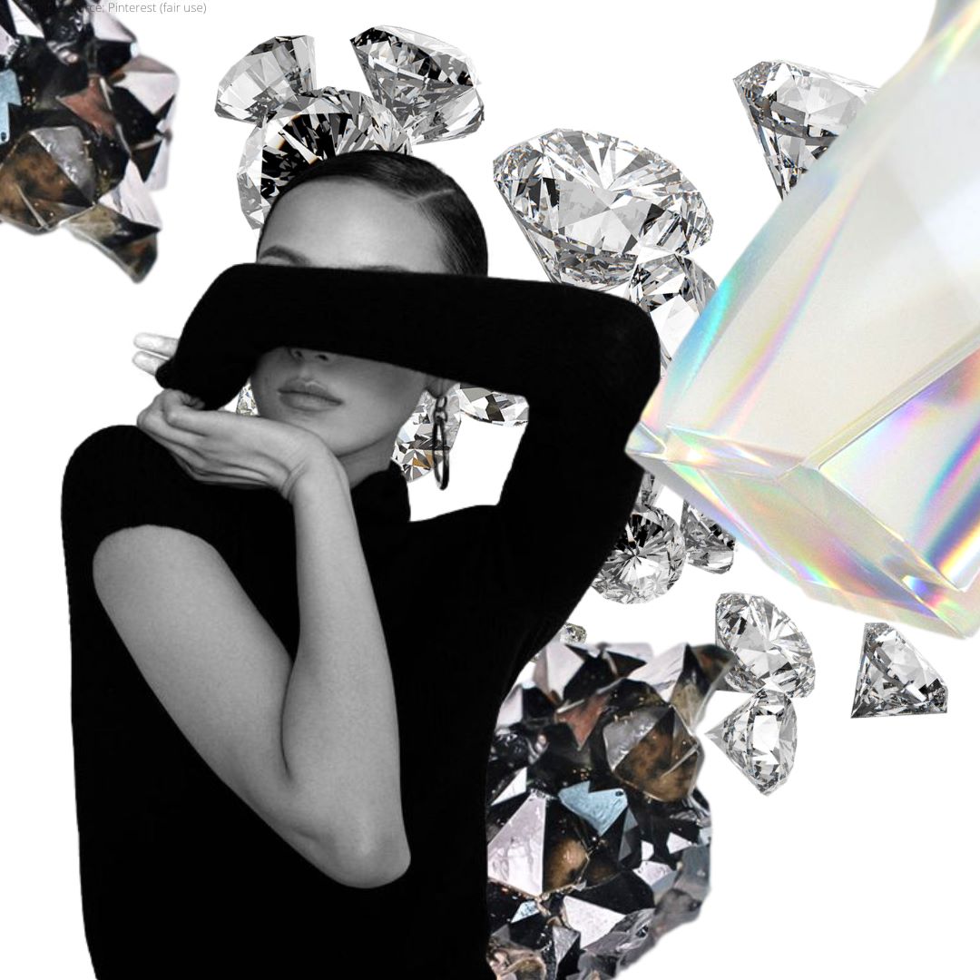 A delicate side part with perfectly slick, straight hair, gives us all the old-Hollywood vibes