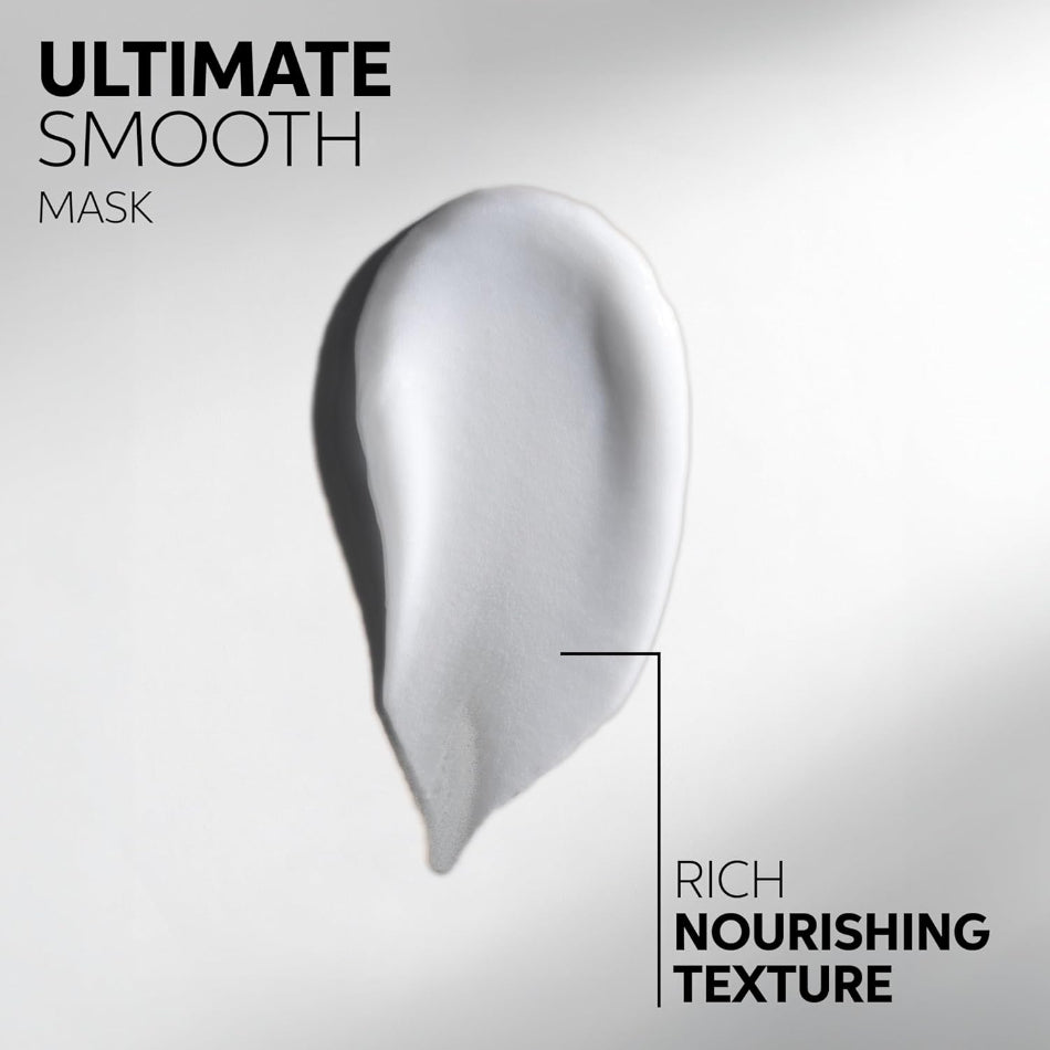 Wella Professionals Ultimate Smooth Mask 200ml

Transform frizzy, unruly hair with the Wella Professionals Ultimate Smooth Mask — a deeply nourishing smoothing treatment powered by patented Squalane &amp; Omega-9 technology. This colour-safe, vegan formula works from the inside out to recreate a protective barrier, delivering silky-smooth, shine-rich results that last up to 96 hours.