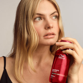 Wella Professionals Ultimate Repair Shampoo is a lightweight cream shampoo with a rich, foaming texture that gently yet thoroughly cleanses while actively repairing damage from the inside out. Powered by patented AHA and Omega-9 technology, it detoxifies hair from metals, rebuilds strength, and leaves every strand looking healthier, shinier, and smoother.