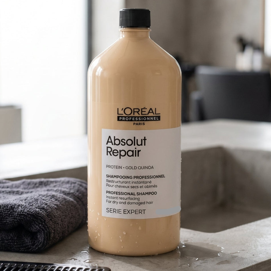'Oréal Professionnel Absolut Repair Shampoo 1500ml is a professional-grade cleansing treatment engineered to reconstruct and restore severely damaged hair from the inside out. Whether your hair has been weakened by chemical treatments, heat styling, or environmental stress — this jumbo-size shampoo delivers instant transformation with every wash.