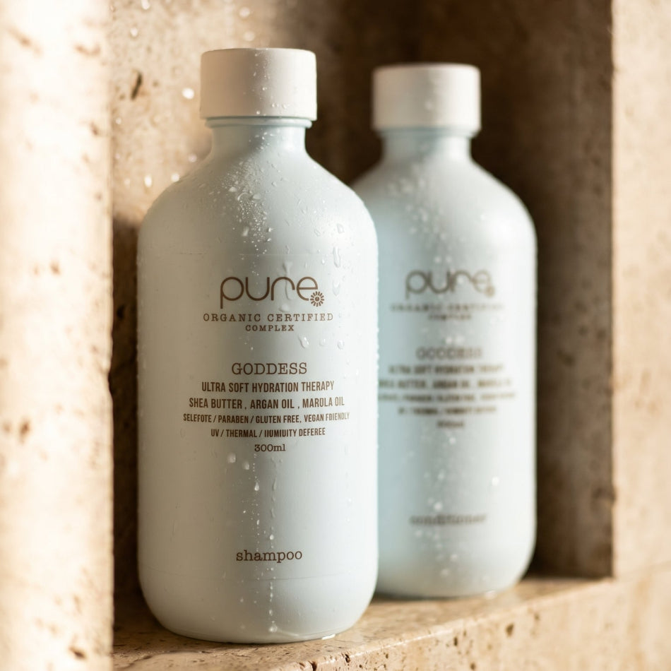 PURE by Juuce Goddess Bath &amp; Rinse Duo — a luxurious shampoo and conditioner set formulated to hydrate, soften, and smooth all hair types. Sulphate-free and paraben-free, it's gentle enough for colour-treated hair yet powerful enough for daily use.