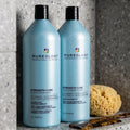 Pureology Strength Cure 1L Duo. This professional-size sulfate-free shampoo and conditioner system is specifically engineered to repair damage from heat styling, physical wear and tear, and chemical overprocessing while preserving your vibrant color. Trusted by professional colorists worldwide, this duo delivers visible strength and softness from the very first use.