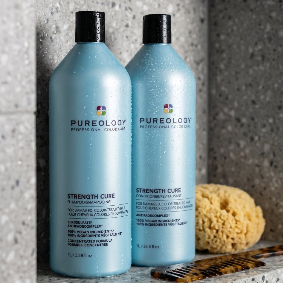 Pureology Strength Cure 1L Duo. This professional-size sulfate-free shampoo and conditioner system is specifically engineered to repair damage from heat styling, physical wear and tear, and chemical overprocessing while preserving your vibrant color. Trusted by professional colorists worldwide, this duo delivers visible strength and softness from the very first use.
