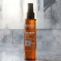 Redken Frizz Dismiss Anti-Static Oil Mist 125ml

Say goodbye to flyaways and static with this featherlight oil mist that smooths and controls frizz on contact — without any heaviness or grease. Powered by Redken's Smoothing Complex and sustainably sourced Babassu Oil, it delivers instant polish and all-day frizz defence.