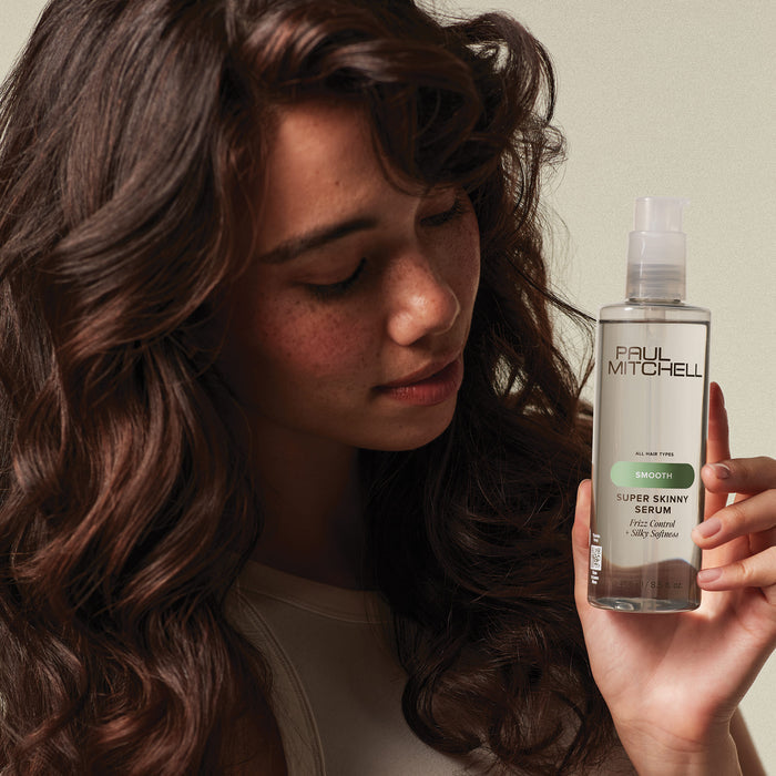 Cut down your blow-dry time and achieve silky, smooth hair with the Paul Mitchell Super Skinny Serum. This best-selling hair serum is a must-have styling essential, offering up to 232°C (450°F) heat protection while reducing drying time for faster, sleeker results. The humidity-resistant formula tames frizz, smooths the cuticle, and leaves hair with long-lasting shine that holds up in any weather. Lightweight silicones absorb quickly without weighing hair down, making it ideal for creating a polished, frizz