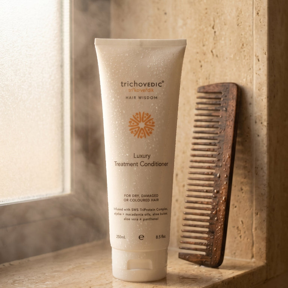 Trichovedic Luxury Treatment Conditioner 250ml

A rich, instant-acting treatment conditioner formulated for keratin-treated, coloured, dry, and damaged hair. Infused with a professional-grade blend of oils, proteins, and botanicals to restore shine, strength, and elasticity with every wash.