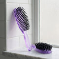 Meet the Duboa Lilac Brush Duo — a Large 80 and Medium 60 pairing crafted in Japan for hair that deserves professional-grade care every single day. Whether you're working through thick, coarse strands or maintaining a fine blowout, these brushes glide through knots with zero snagging.